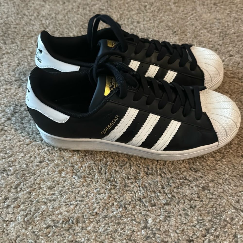 Adidas superstar black and white sneakers